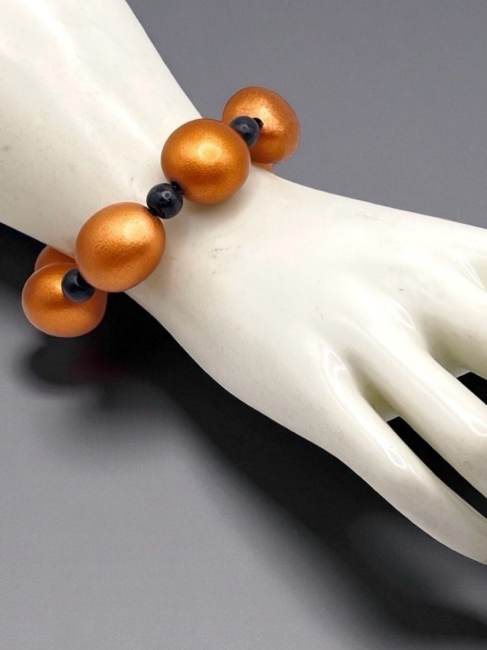 Fashionable Matte Metallic Copper and Black Wood Bead Stretch Bracelet